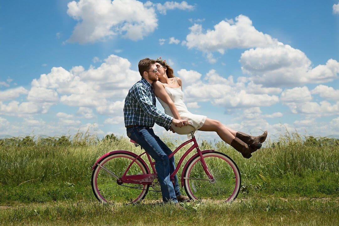 Romantic Couple on Bicycle together